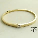 Gouden slavenarmband met briljant Gouden slavenarmband met briljant