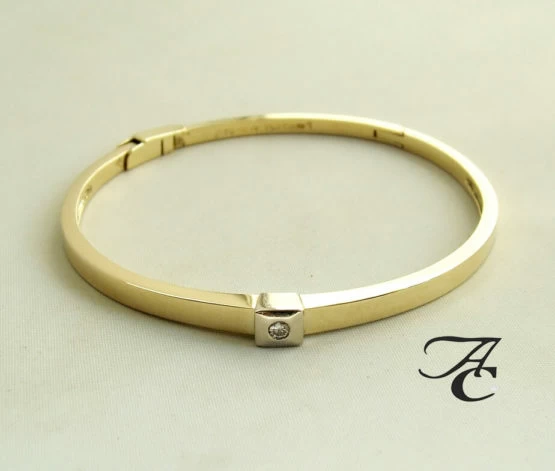 Gouden slavenarmband met briljant Gouden slavenarmband met briljant