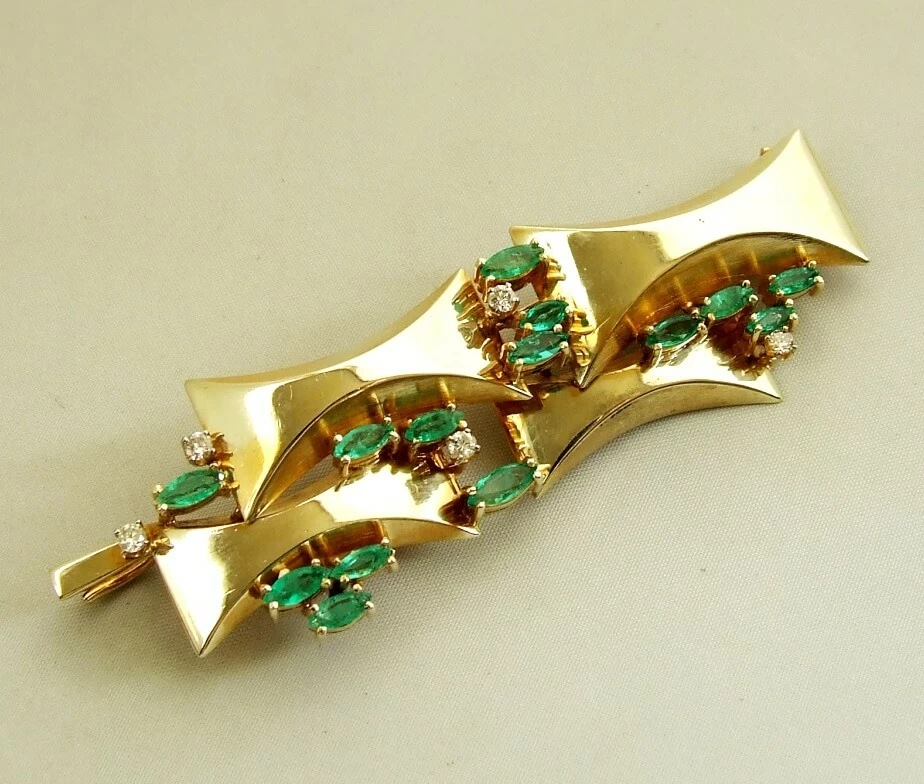 Gouden broche met diamanten en smaragd