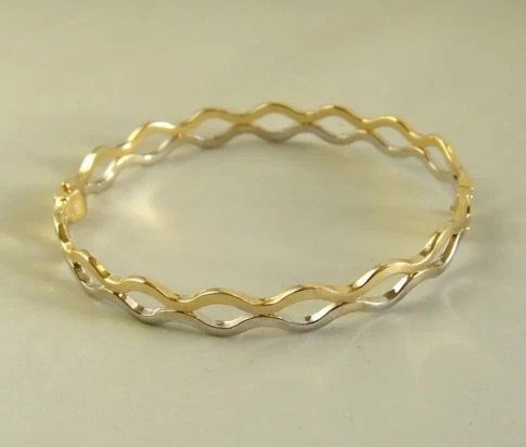 14 karaat geel- en wit gouden slavenarmband