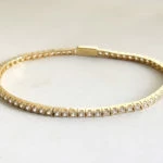 14 karaat geel gouden armband met zirkonia 14 karaat geel gouden armband met zirkonia