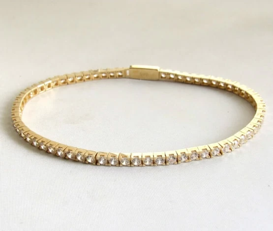 14 karaat geel gouden armband met zirkonia 14 karaat geel gouden armband met zirkonia
