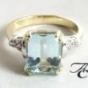 Bicolor ring met aquamarijn en diamanten