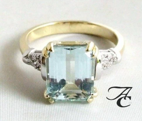 Bicolor ring met aquamarijn en diamanten