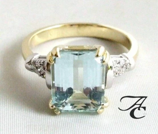 Bicolor ring met aquamarijn en diamanten