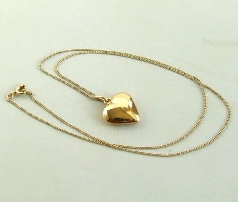 Geel gouden collier met harten hanger