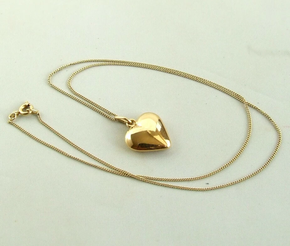 Geel gouden collier met harten hanger