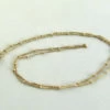 Gouden collier met balletjes