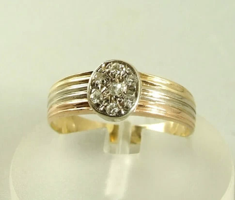 Tricolor gouden ring met diamanten