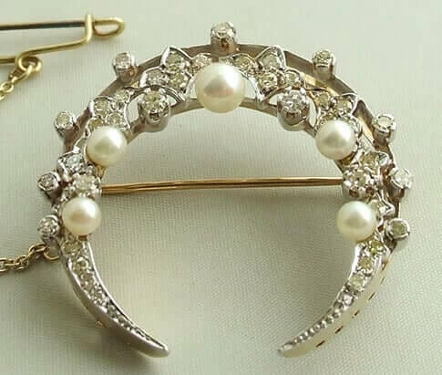 Bicolor broche met parels en diamanten