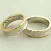Bicolor trouwringen met diamant