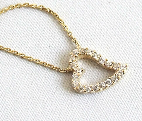 Gouden collier en hanger met zirkonia