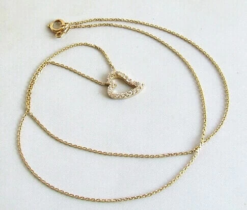 Gouden collier en hanger met zirkonia