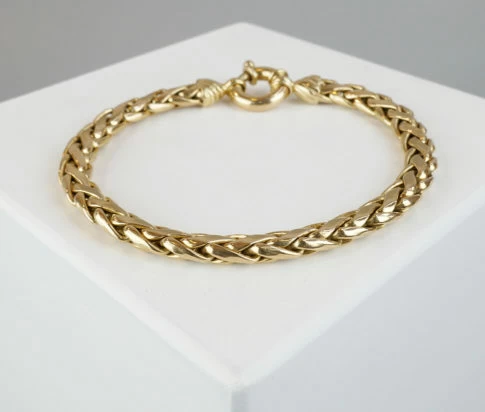 14 karaat geel gouden gevlochten armband
