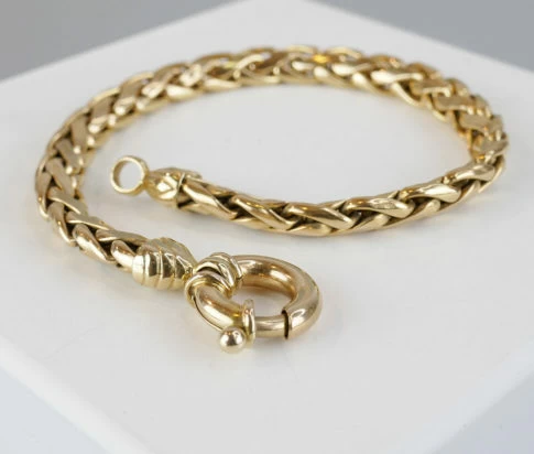 14 karaat geel gouden gevlochten armband