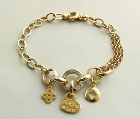 14 karaat gouden bedeltjes armband