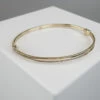 14 karaat gouden slavenarmband met veerslot