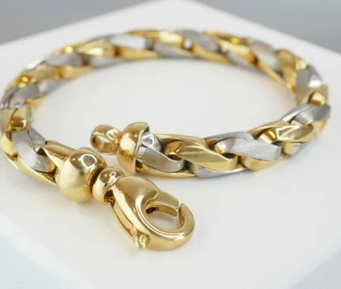 Christian armband bicolor goud