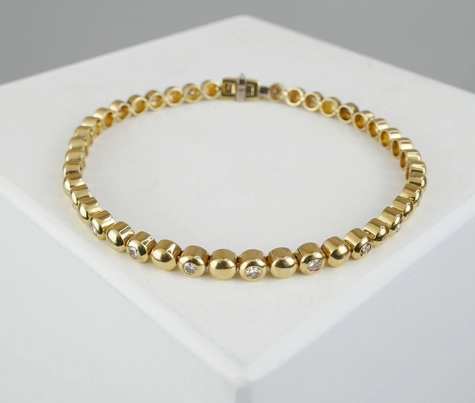 Geel gouden tennisarmband met diamanten