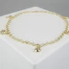 Gouden bedeltjes enkelband