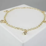 Gouden bedeltjes enkelband