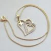 Gouden collier met zirkonia hanger