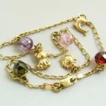 Gouden enkelband met bedels