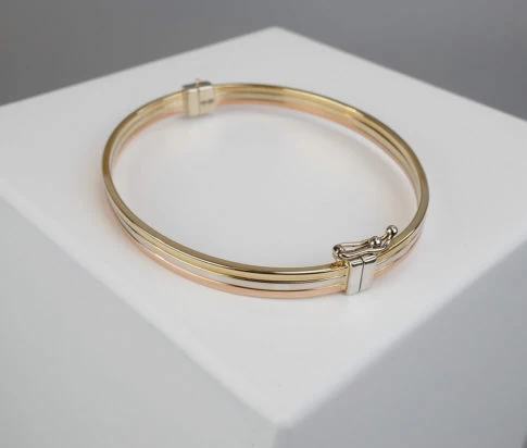 Gouden tricolor slavenarmband vlak model
