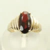 Occasion geel gouden ring met granaat