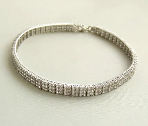 Wit gouden zirkonia schakelarmband