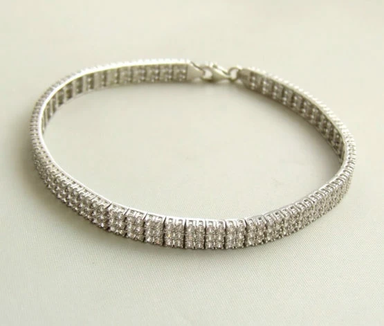 Wit gouden zirkonia schakelarmband Wit gouden zirkonia schakelarmband