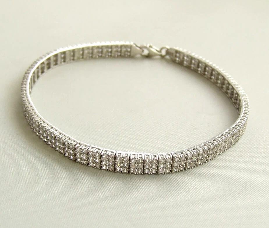 Wit gouden zirkonia schakelarmband