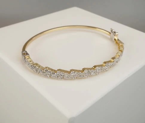 Geel gouden zirkonia schakelarmband