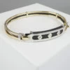 Gouden slavenarmband met leer