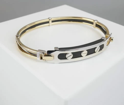 Gouden slavenarmband met leer