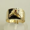 Gouden adelaar diamanten ring met robijn