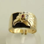 Gouden adelaar diamanten ring met robijn