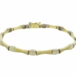 Christian schakelarmband bicolor