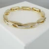 Dubbelzijdige bicolor gouden scharnierarmband