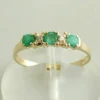 Gouden ring met smaragd en diamanten