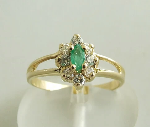 Gouden ring met smaragd en zirkonia