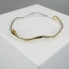 14 karaat gouden bicolor slavenarmband Christian