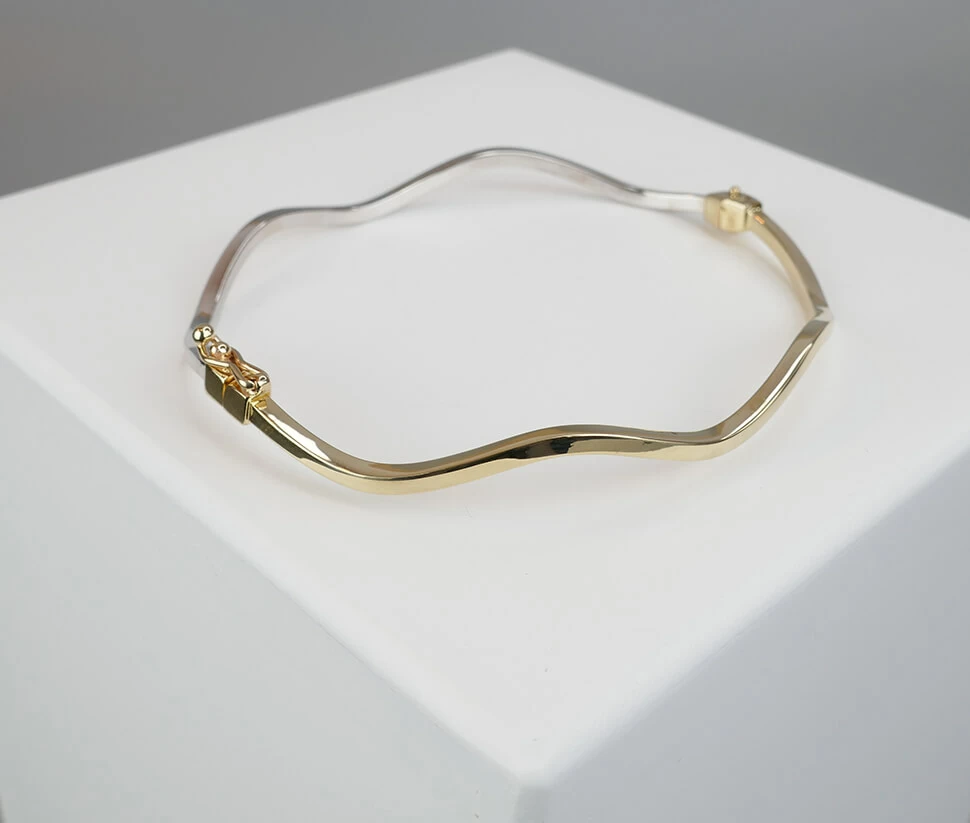 14 karaat gouden bicolor slavenarmband Christian