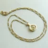 Occasion gouden collier en hanger met diamant
