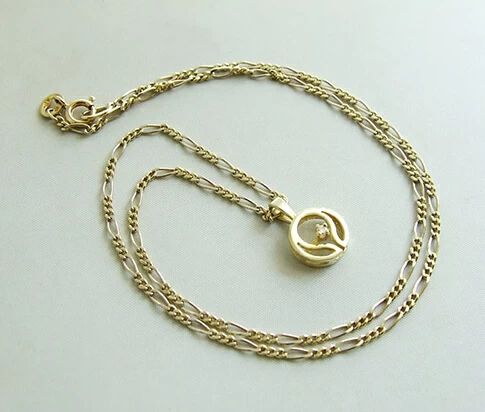 Occasion gouden collier en hanger met diamant