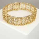 Geel gouden fantasie schakelarmband