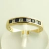 Geel gouden ring met diamant en saffier