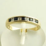 Geel gouden ring met diamant en saffier Geel gouden ring met diamant en saffier