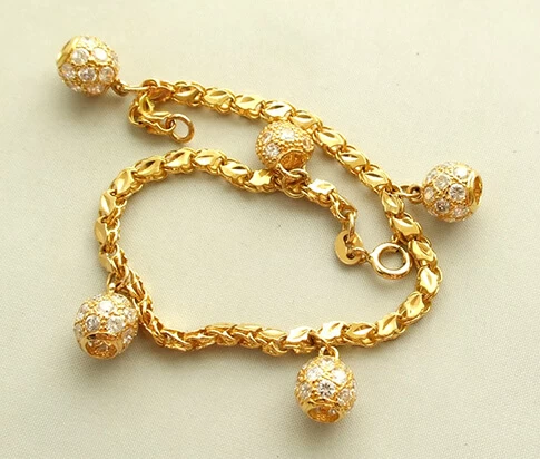 Christian 22 karaat gouden armband met zirkonia