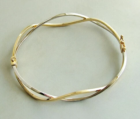 Christian bicolor gouden slavenarmband